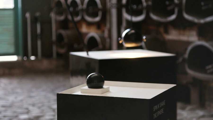 A video still by Anastasia Alekseeva showing the sonicsphere instrument at rest on a plinth at Athens Science Festival 2018.