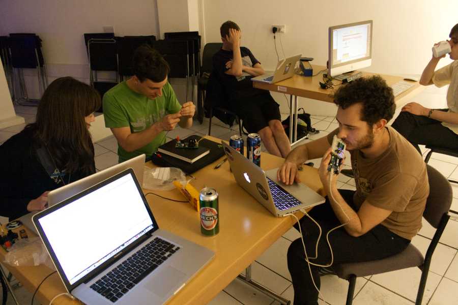 Some of the artists behind Cave of Sounds meeting to share progress on their instruments. Photo: Tim Murray-Browne