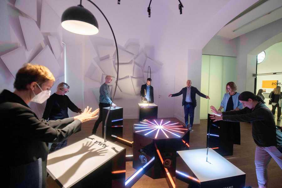 Staff of the Milan Museum of Science and Technology play with Cave of Sounds, interactive sound installation by Tim Murray-Browne and the Music Hackspace Ensemble. Photographer: Andrea Fasani